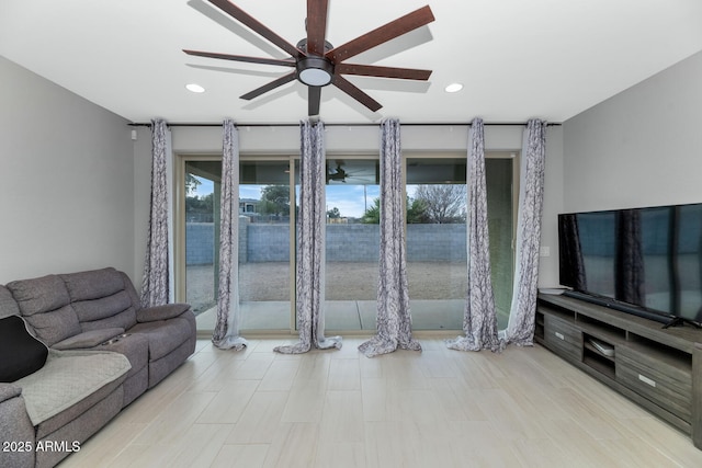 living room with ceiling fan