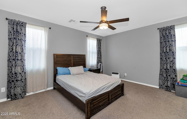 carpeted bedroom featuring ceiling fan