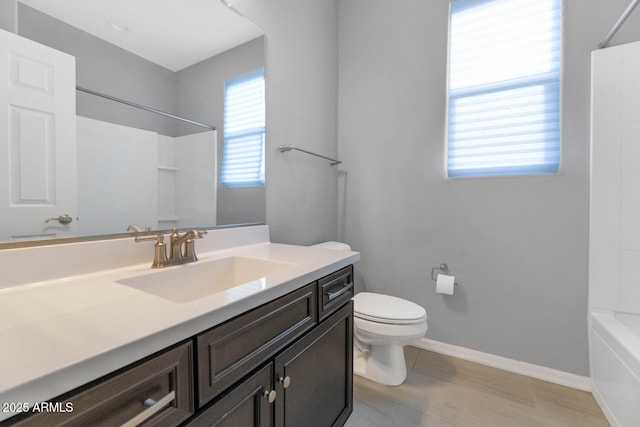 full bathroom featuring vanity, toilet, and shower / bath combination