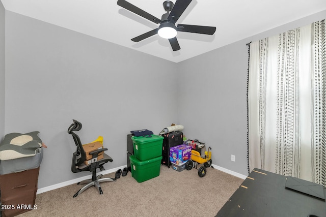 rec room with ceiling fan and carpet floors