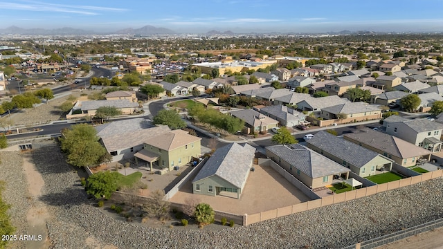 birds eye view of property featuring a mountain view