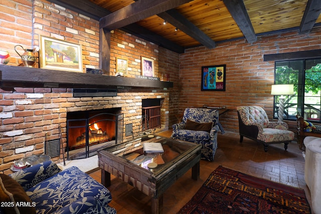 living area featuring a fireplace, brick floor, wooden ceiling, and brick wall