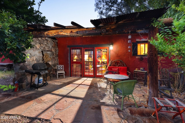 view of patio / terrace with grilling area and french doors