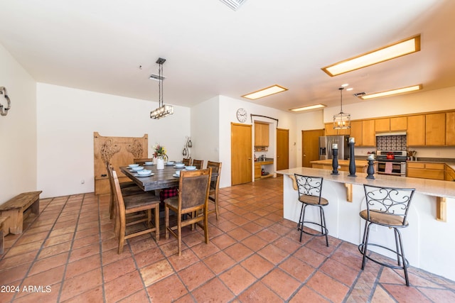 dining room with tile patterned flooring