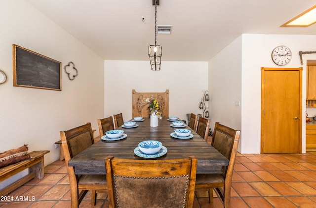 dining room with tile patterned flooring