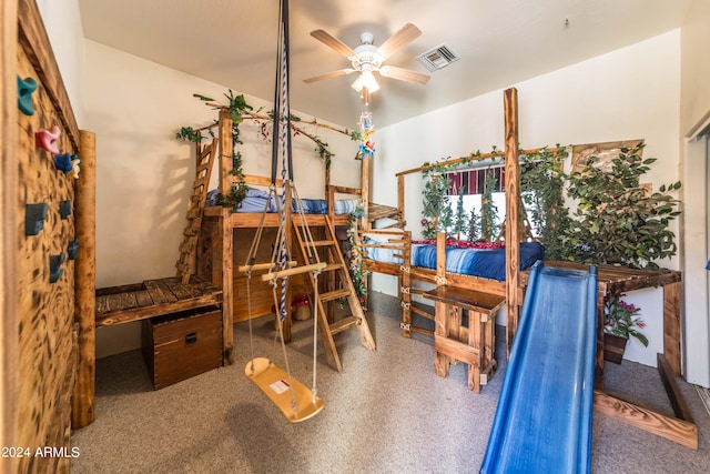 interior space featuring ceiling fan