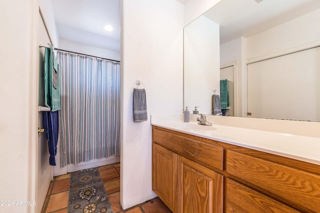 bathroom with vanity and tile patterned floors