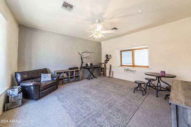 sitting room featuring carpet flooring and ceiling fan