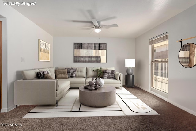 carpeted living room with ceiling fan