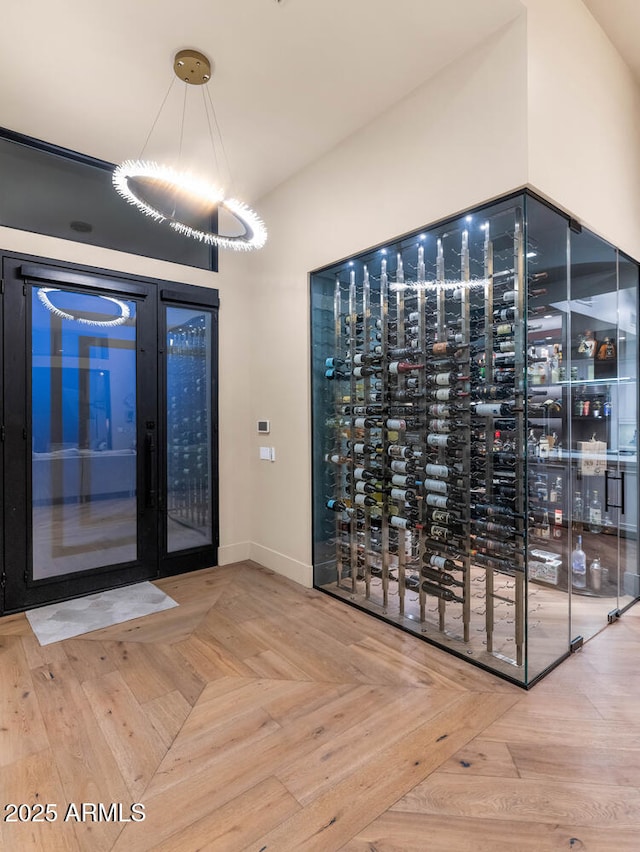 wine room with electric panel and baseboards