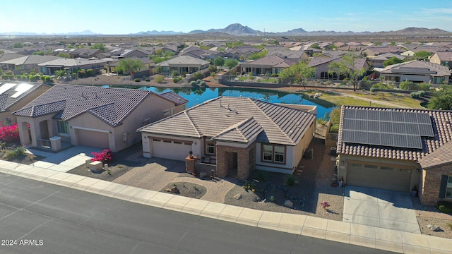 bird's eye view with a mountain view and a residential view