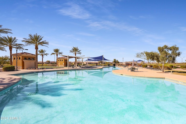 pool with a patio area