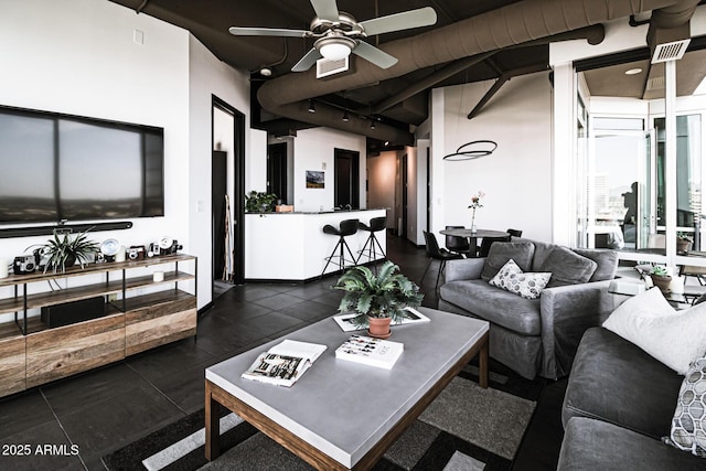 1 E Lexington Ave Unit 1209, Phoenix, AZ 85012 - living area featuring ceiling fan, rail lighting, and dark tile patterned flooring