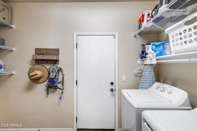 laundry room with independent washer and dryer and laundry area