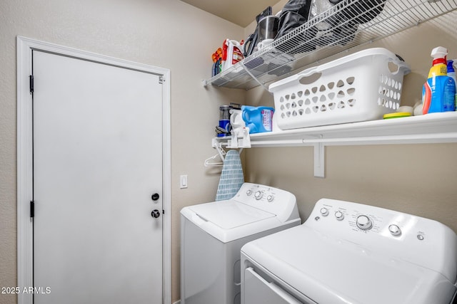 laundry room featuring laundry area and washing machine and clothes dryer