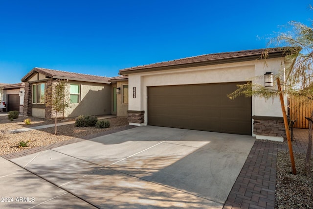 view of front of property with a garage