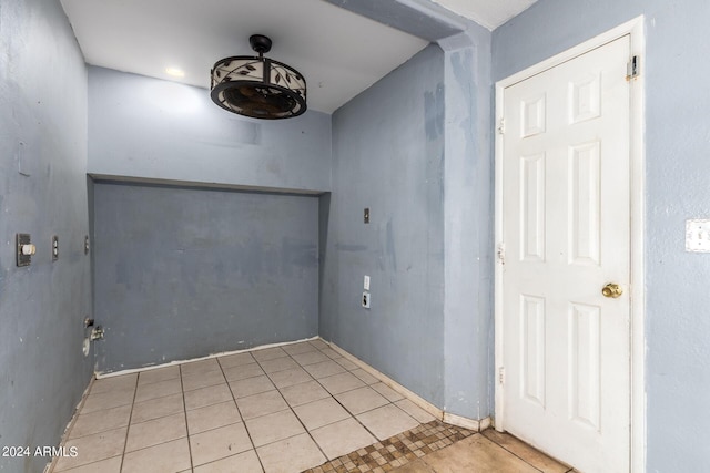 interior space with light tile patterned floors