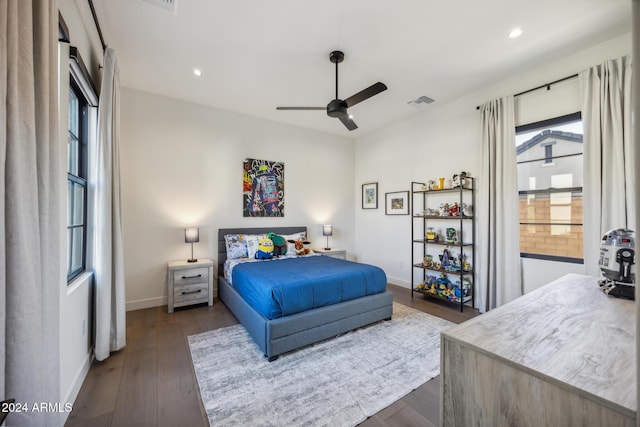 bedroom featuring dark hardwood / wood-style floors and ceiling fan