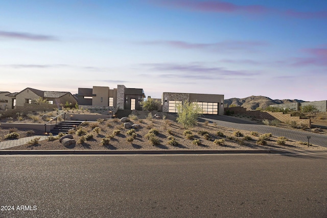 view of front of property with a mountain view