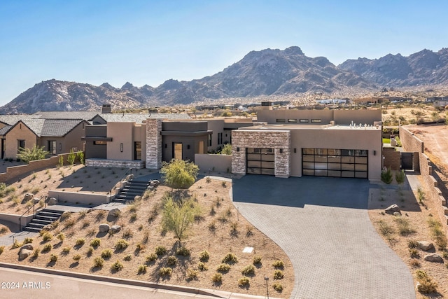 pueblo-style house with a mountain view