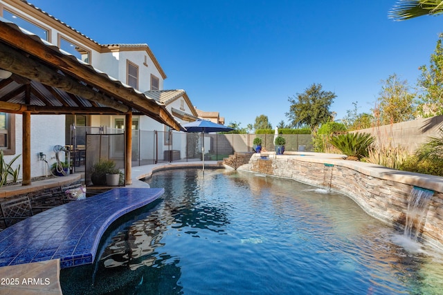 view of pool with a fenced in pool, a fenced backyard, a patio, and a gazebo