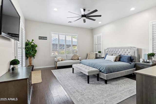 bedroom featuring baseboards, visible vents, a ceiling fan, dark wood-style flooring, and recessed lighting