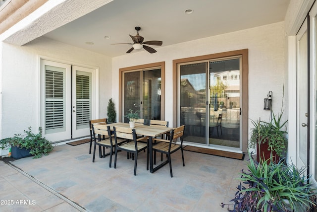 view of patio with ceiling fan, french doors, and outdoor dining space