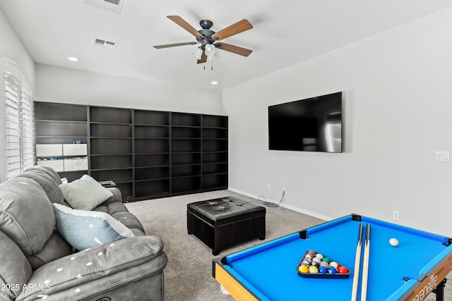 rec room with carpet floors, baseboards, and visible vents