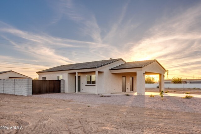 back of house featuring a patio area