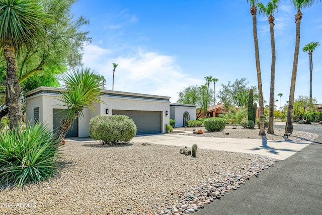 single story home with a garage