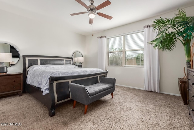 bedroom with baseboards, carpet, and a ceiling fan