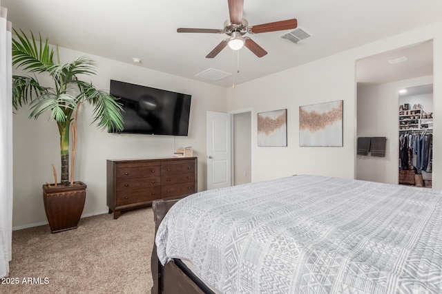 bedroom with a ceiling fan, carpet, and visible vents