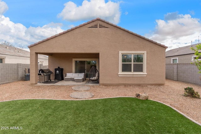 back of property featuring a patio area, a fenced backyard, and stucco siding