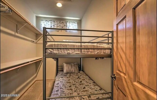 unfurnished bedroom with recessed lighting and carpet