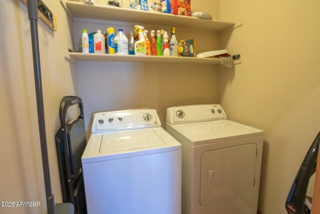 clothes washing area featuring laundry area and independent washer and dryer