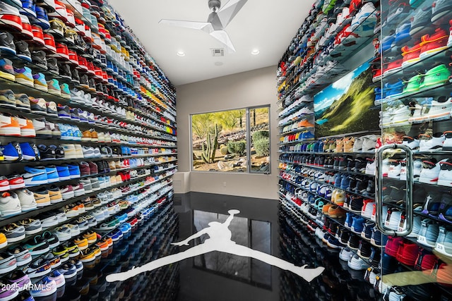 wine area featuring visible vents and ceiling fan