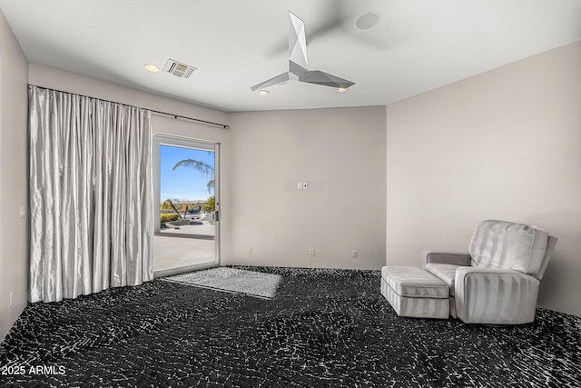 sitting room with visible vents and recessed lighting