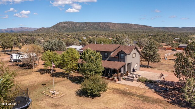 bird's eye view with a mountain view