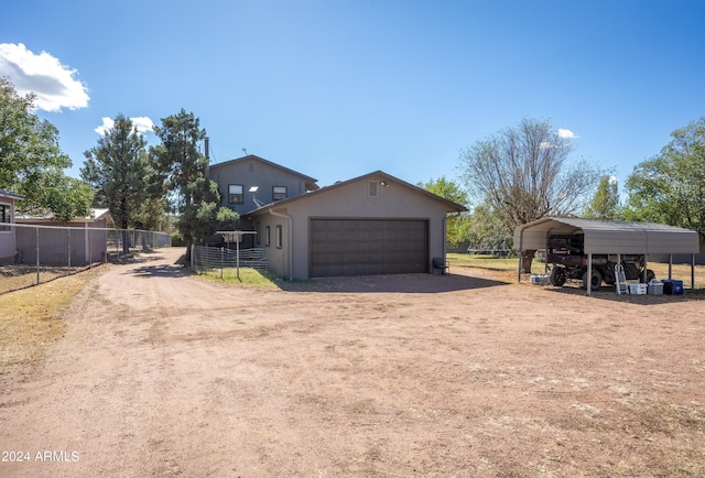 exterior space featuring a carport