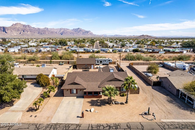 birds eye view of property with a residential view and a mountain view