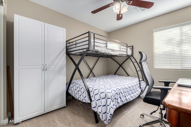 bedroom with carpet and ceiling fan