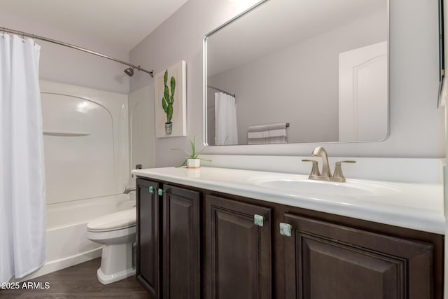 bathroom with toilet, shower / bath combination with curtain, wood finished floors, and vanity