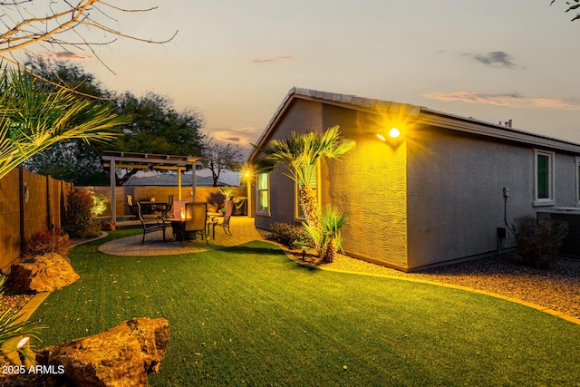 view of yard with a fenced backyard, a patio, and a pergola