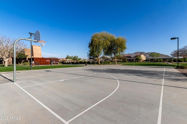 view of sport court featuring community basketball court