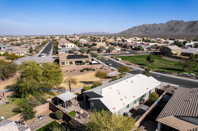 drone / aerial view with a residential view and a mountain view