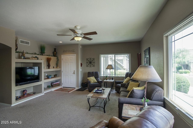 9750 N Monterey Dr Unit 71, Fountain Hills, AZ 85268 - carpeted living area with plenty of natural light, a ceiling fan, and built in shelves