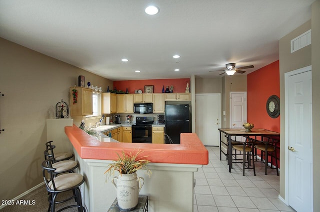9750 N Monterey Dr Unit 71, Fountain Hills, AZ 85268 - kitchen with black appliances, a peninsula, a sink, recessed lighting, and a ceiling fan