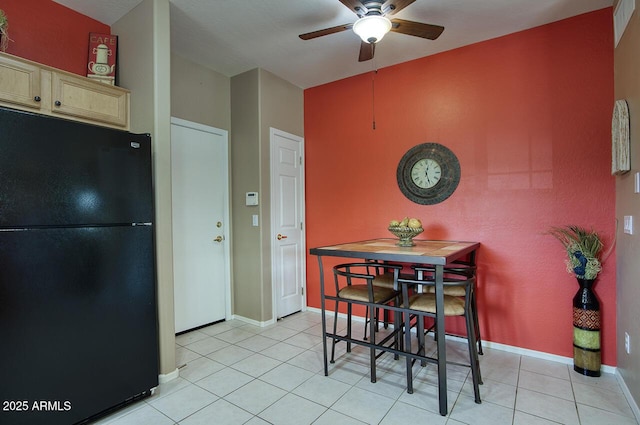 9750 N Monterey Dr Unit 71, Fountain Hills, AZ 85268 - dining area featuring ceiling fan, light tile patterned floors, and baseboards
