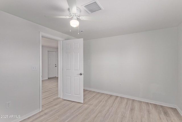 423 W Phoenix Ave, Eloy, AZ 85131 - unfurnished room with baseboards, light wood-style floors, ceiling fan, and visible vents