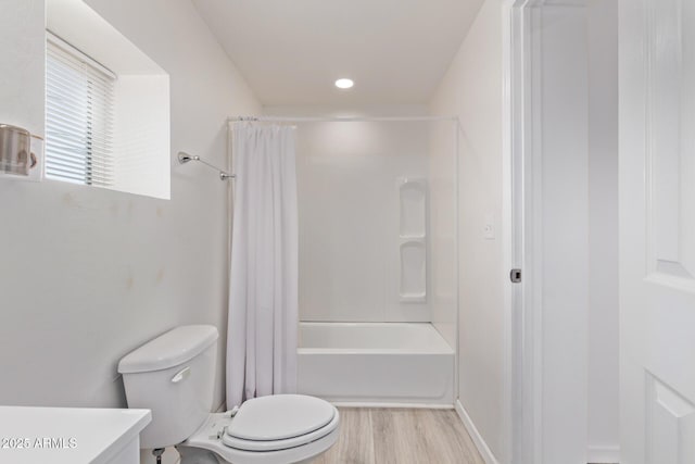 423 W Phoenix Ave, Eloy, AZ 85131 - bathroom with toilet, shower / bath combo with shower curtain, vanity, and wood finished floors
